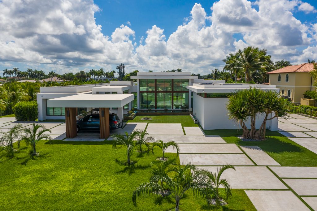 modern luxury home featuring clean lines and a symmetrical design