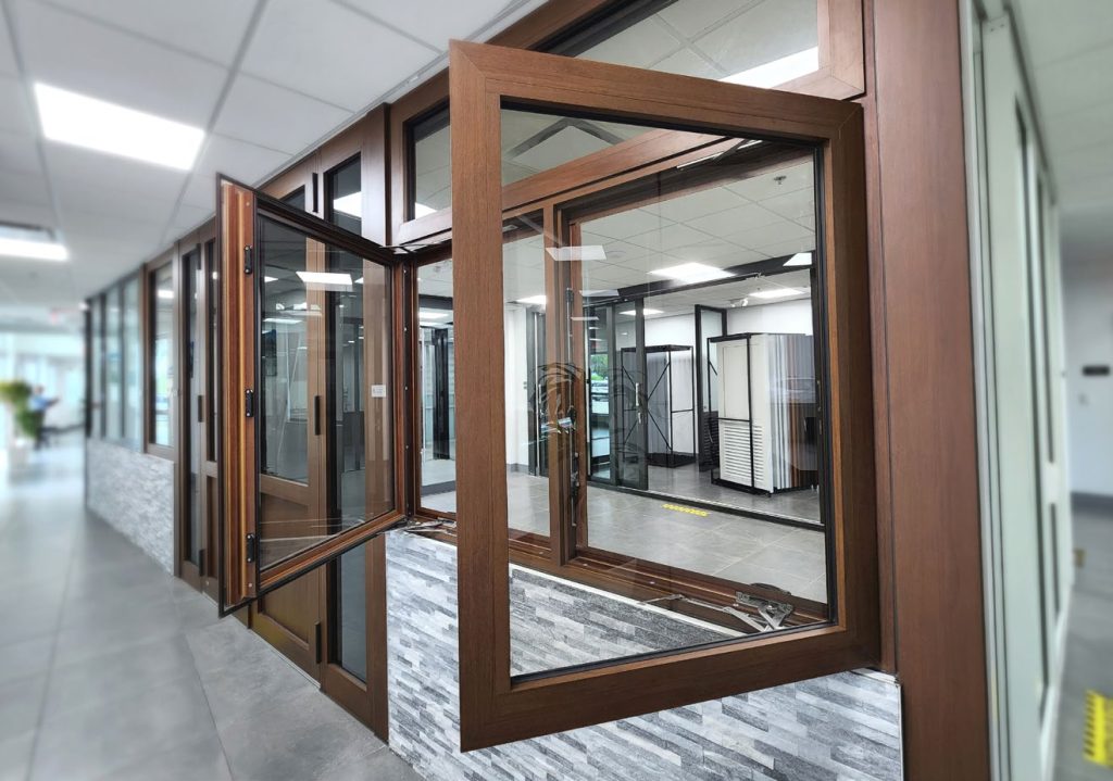 modern display of wooden-framed, double-glass windows in a showroom setting